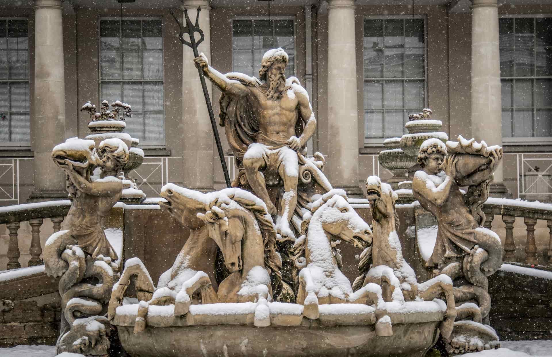 Neptune statue in Cheltenham covered in snow